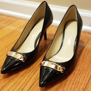 Pumps by Coach
